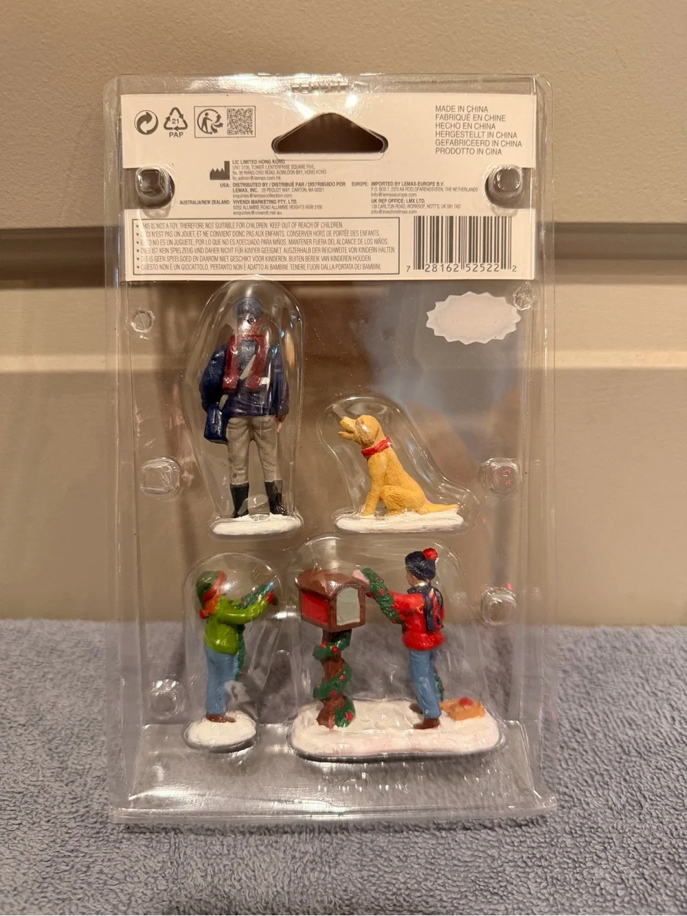 Lemax Holiday Village Figurine Set - Red, Blue, Green, Yellow Accents
